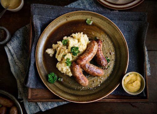 How to make the ultimate comforting bangers and mash recipe with onion gravy - Thomas Joseph Butchery